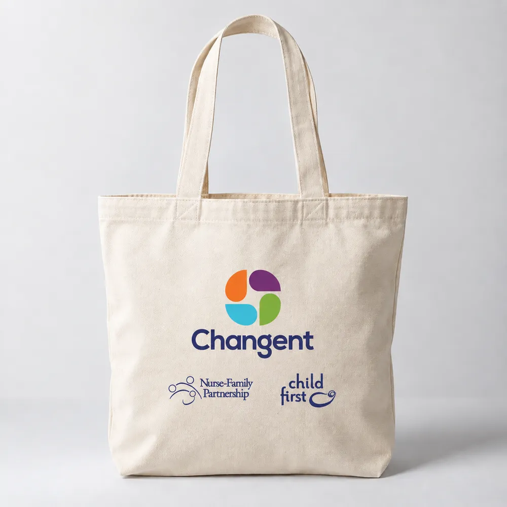 Changent cotton tote bag from the shared network catalog, shown with the approved partner logo lockups